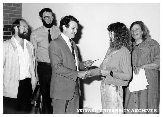 Ceramic Design student Denise Mitchell receiving award from Jeffery Lowenger of Z-Tech, watched by, from left: Stephen Fletcher, Ceramic Design; David Parris, Z-Tech; and Jenny Zimmer, Dean of Art and Design