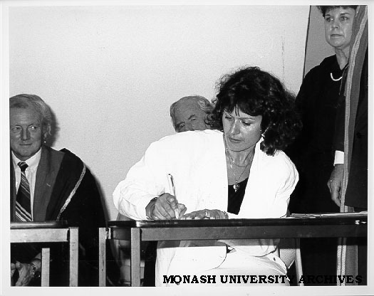 Signing of Monash-GIAE Affiliation agreement, Student representative Ms Fatima Alisak (Chairperson of Monash Association of Students), Gippsland Institute Director Dr Tom Kennedy (left) looking on