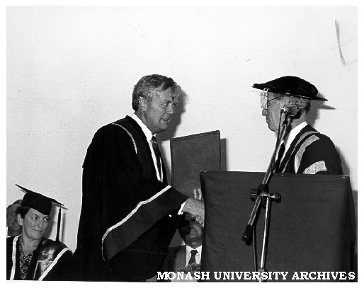 Exchange of Monash-GIAE Affiliation documents, Deputy Chancellor Mr Arnold Hancock (right) and Mr Crofton Hatsell, President of Gippsland Institute Council
