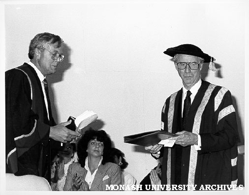 Exchange of Monash-GIAE Affiliation documents. Deputy Chancellor Mr Arnold Hancock (right) and Mr Crofton Hatsell, President of the Council of Gippsland Institute