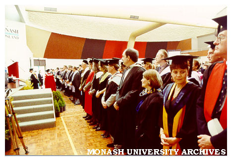 Academic procession leaving dais after first Gippsland graduation ceremony