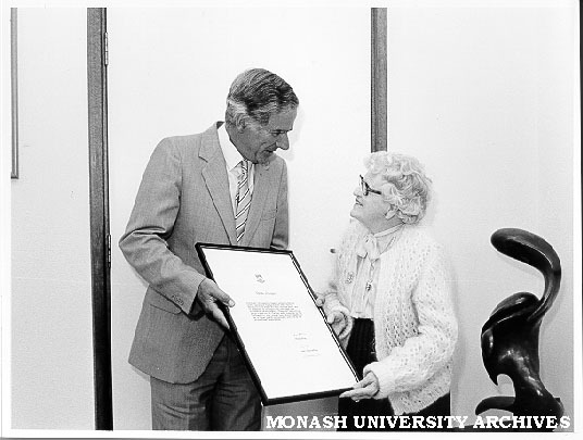 Professor Ray Martin presenting Mrs Vera Moore with Certificate of Appreciation