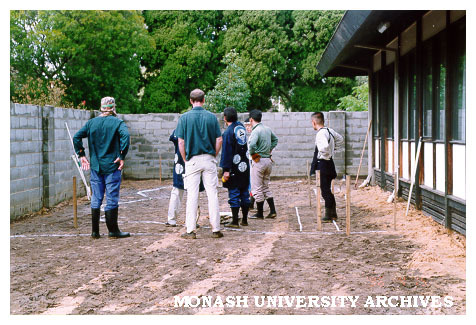 Landscape team staking out foundations for Japanese Garden