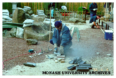 Cutting tiles for roof of Kenninji style fence, Japanese Garden