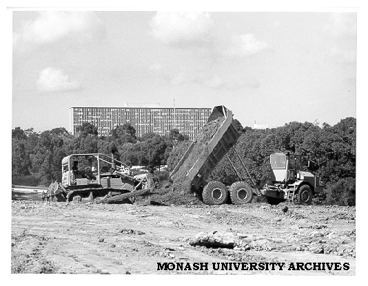 Earthmoving for proposed lake with Humanities building in background
