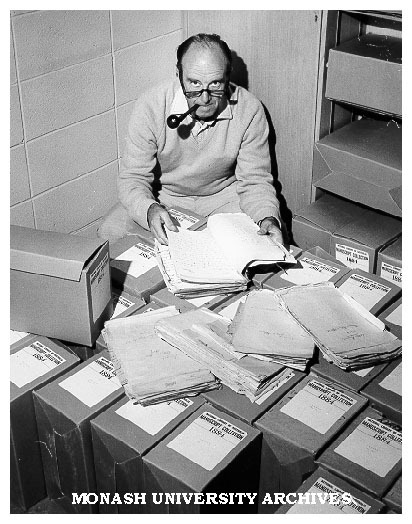 Dr Geoffrey Serle with Monash papers