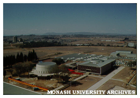 Religious Centre under construction with University Offices at right
