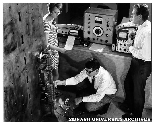 Researchers in engineering laboratory