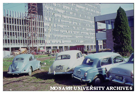 Menzies building, second stage under construction, with University Union at right