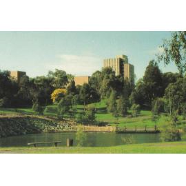 Postcard showing Halls of Residence and lake