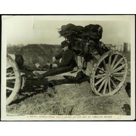 A French artilleryman makes coffee on his gun in Northern France