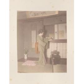 Women placing a rose on a shelf