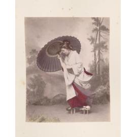 Woman walking with a parasol 