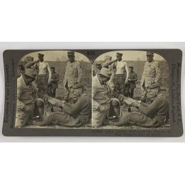 Allied soldiers binding up the wounds of their prisoners after the battle