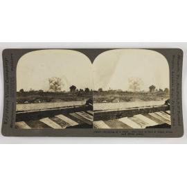 Bursting of a shell.  The gun is out of sight miles andmiles away