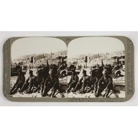 Unloading stores, Beach W ; a Turkish death-trap taken by brave Lancasters under a tornado of fire