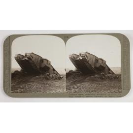 Tadpole tank, especially designed to cross the Hun trenches, moves forward in battle line