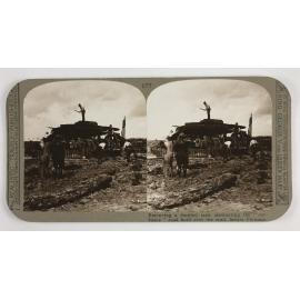 Removing a derelict tank obstructing the "corduroy" road built over the mud, before Peronne
