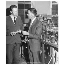 Dr Peter Godfrey (left) and Professor Ron Brown, in the microwave laboratory, Department of Chemistry