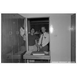 Robert Burford, lecturer in chemistry, (left) and colleague, Caulfield Institute of Technology