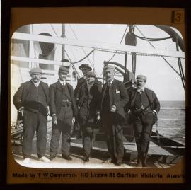 Passengers posing for a photo on ship 