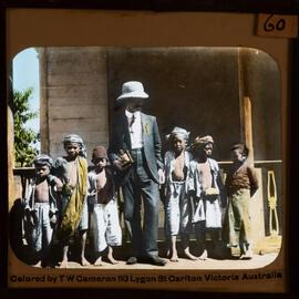 Traveller posing with Indonesian children 