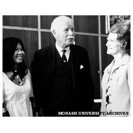 Sir Rohan Delacombe at Caulfield Institute of Technology's 50th Anniversary celebrations with Staff Officer Jenny Taylor (left) and Printing Services Manager Mrs Margaret Blank