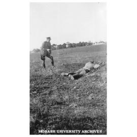 Caulfield Technical School cadet camp. W. O. Bromley instructing Sergeant Easton on 'sniping'