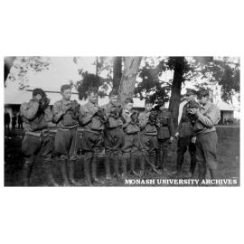 Caulfield Technical School cadet camp. Gas respirator drill with Lieutenant D. Hall