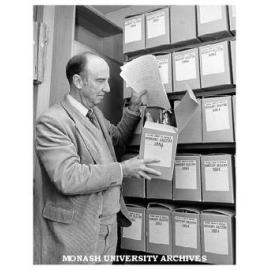 Dr. Geoffrey Serle with Monash papers