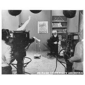 Dr Peter Darvall televising lectures. Left to right: Cameraman: Mr M. Ryan, Floor Manager: Mr D. Black, Talent: Dr P. Darvall, Lecturer, Cameraman: Mr P. Boyle