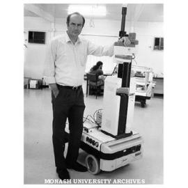 Professor Ray Jarvis, Electrical and Computer Systems Engineering with prototype robot