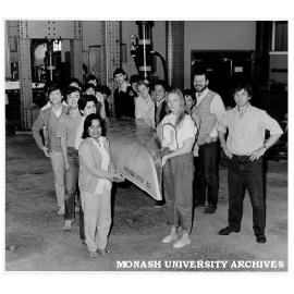 Students and staff with the 'Sir John Monash'. Dr Peter Darvall and Mr Rafael Grzebieta, and 4th Year Civil Engineering students, before the grand Concrete Canoe Race