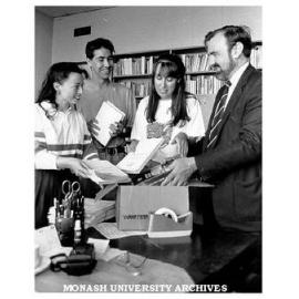 Students assisting Professor David Kemp with his move to Parliament House, Canberra