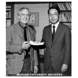 Dean of Arts Professor John Legge receiving donation for Japanese Studies Centre from Mr M. Inukai of Toyota Motor Company