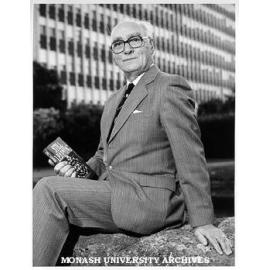 Sir Louis Matheson, former Vice-Chancellor with his recently published work 'Still Learning'