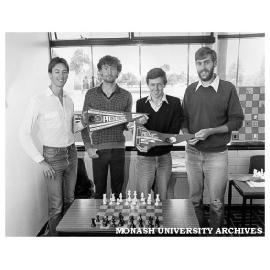 Monash Chess Club members. Winners of 1985 Victorian Chess Association A-grade premiership, from left: Guy West, Matthew Drummond, Ross Thomas, Murray Smith