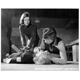 Safety and First Aid Club members Robyn Anker (right) and Jill Poynton, demonstrating Rescue Annie