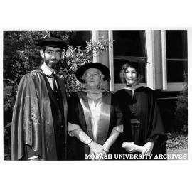 Graduates Dr Michael Fett (left) and Harriet Fett (right), with Dr Ione Fett