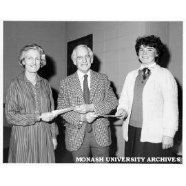 Margaret Scott (left) and Rozlyn Gaffney accepting Garnet H. Carroll awards from Professor John Legge