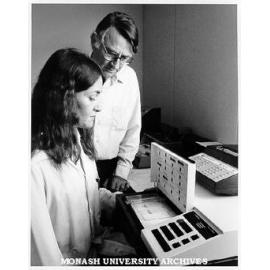 Drs Helen Arthur and Laurie Austin using laser microdensitometer