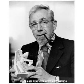 Professor Dennis Lowther with model of human hip joint