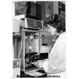 Dr Marie-Isabel Aguilar using Perkin-Elmer equipment