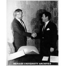 Dean of Medicine Professor Bob Porter (left) awarding Jubilee Research Prize to Dr Wayne Comper