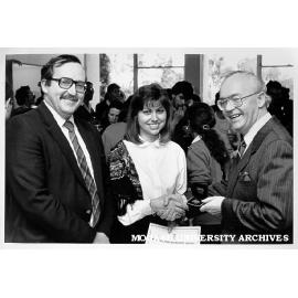 Presentation of inaugural Merck Biochemistry Medal to Meredith Ellis. Managing Director of BDH Chemicals Mr Allan Dewar (right), Professor Milton Hearn (left)