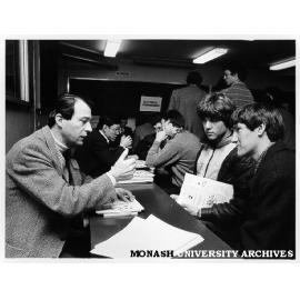 Dr Peter Uhlherr with Hastings High School students