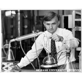 Associate Professor John Agnew testing oil re-refining technique