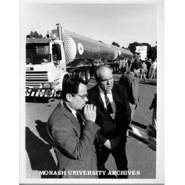 Participants in symposium on B-double semi-trailers