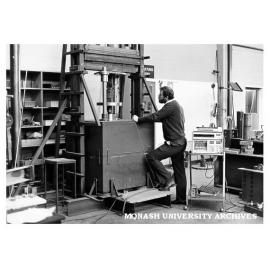 Raphael Grzebieta with equipment for testing structures under crash conditions