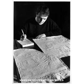 Paul Wilson transcribing ancient Greek inscriptions from 'squeeze'